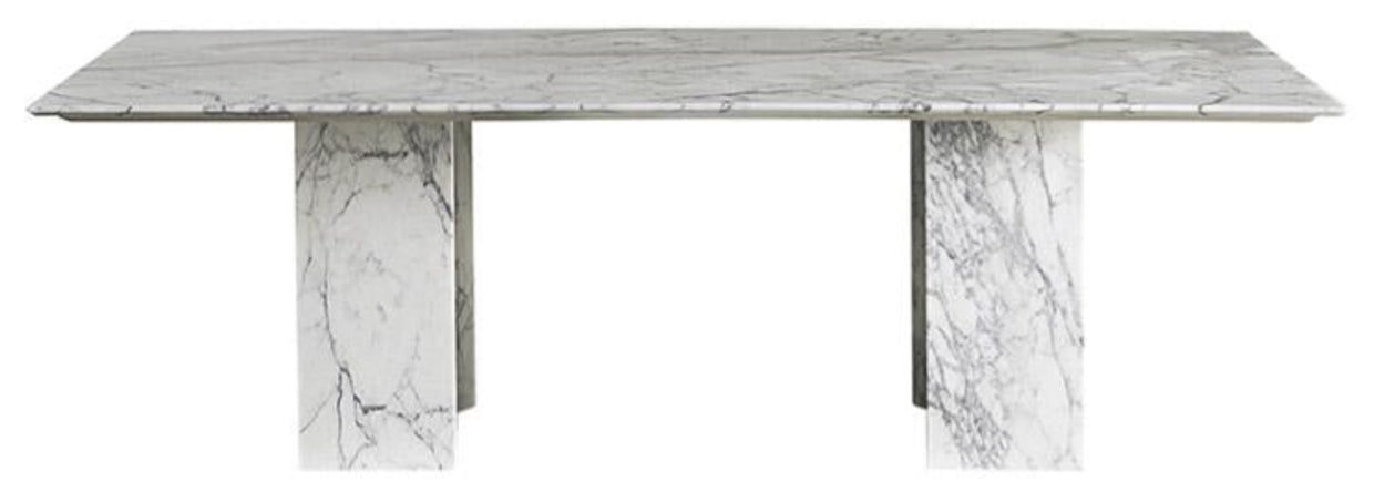 Casamilano Karl marble dining table with rectangular top and sturdy legs. A modern, luxurious centerpiece for sophisticated dining rooms