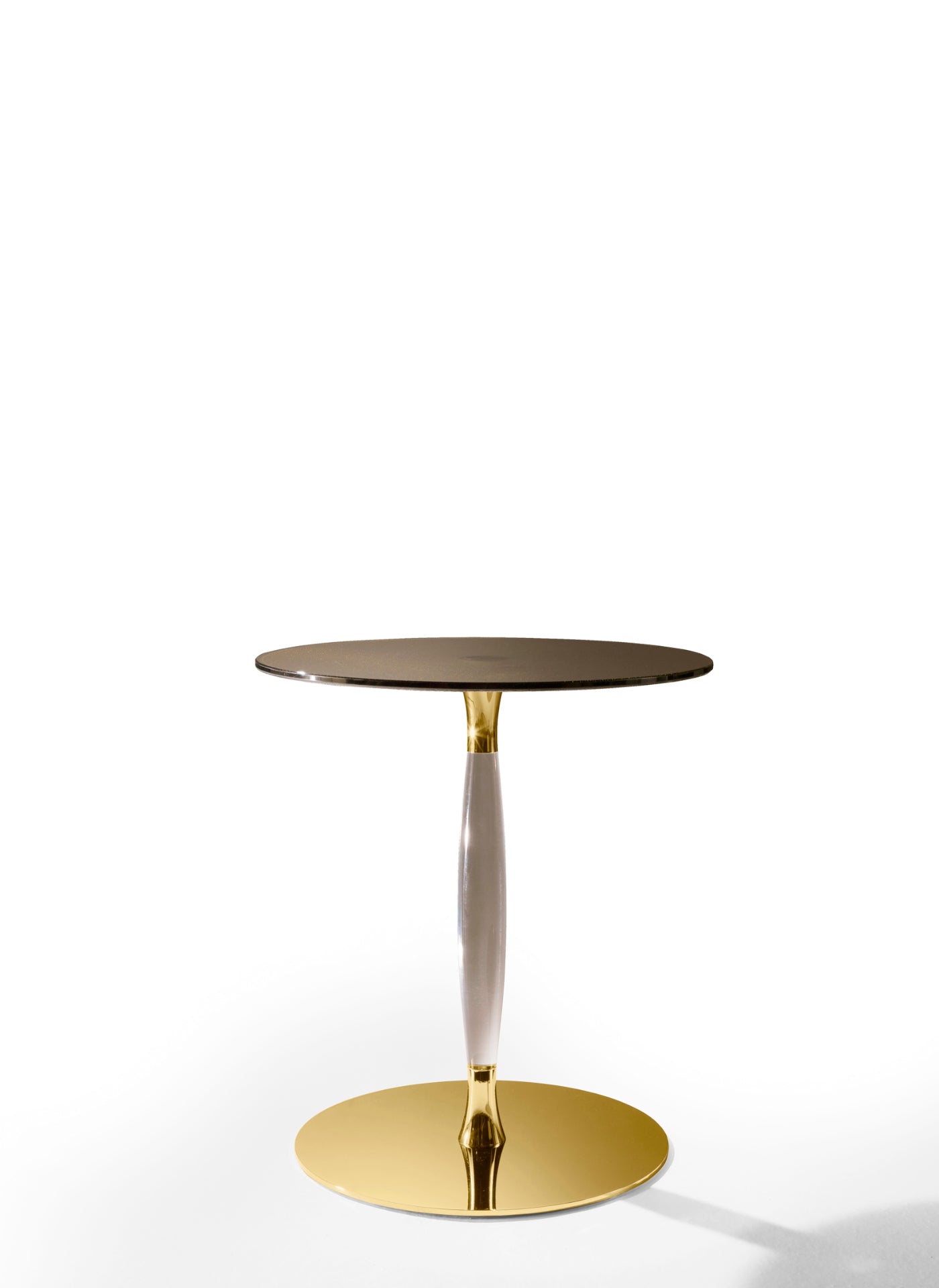 View of modern side table with gold base and dark top.