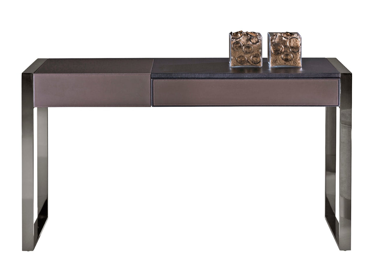 Console table with metal legs, leather drawers, and two glass decor pieces