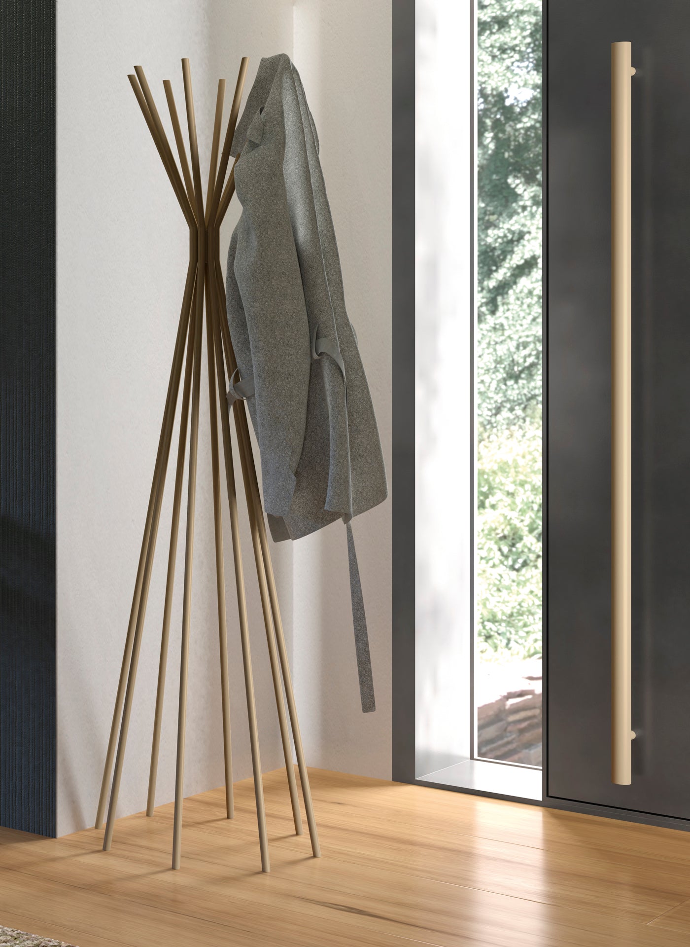 View of entryway with wooden coat rack holding gray coat