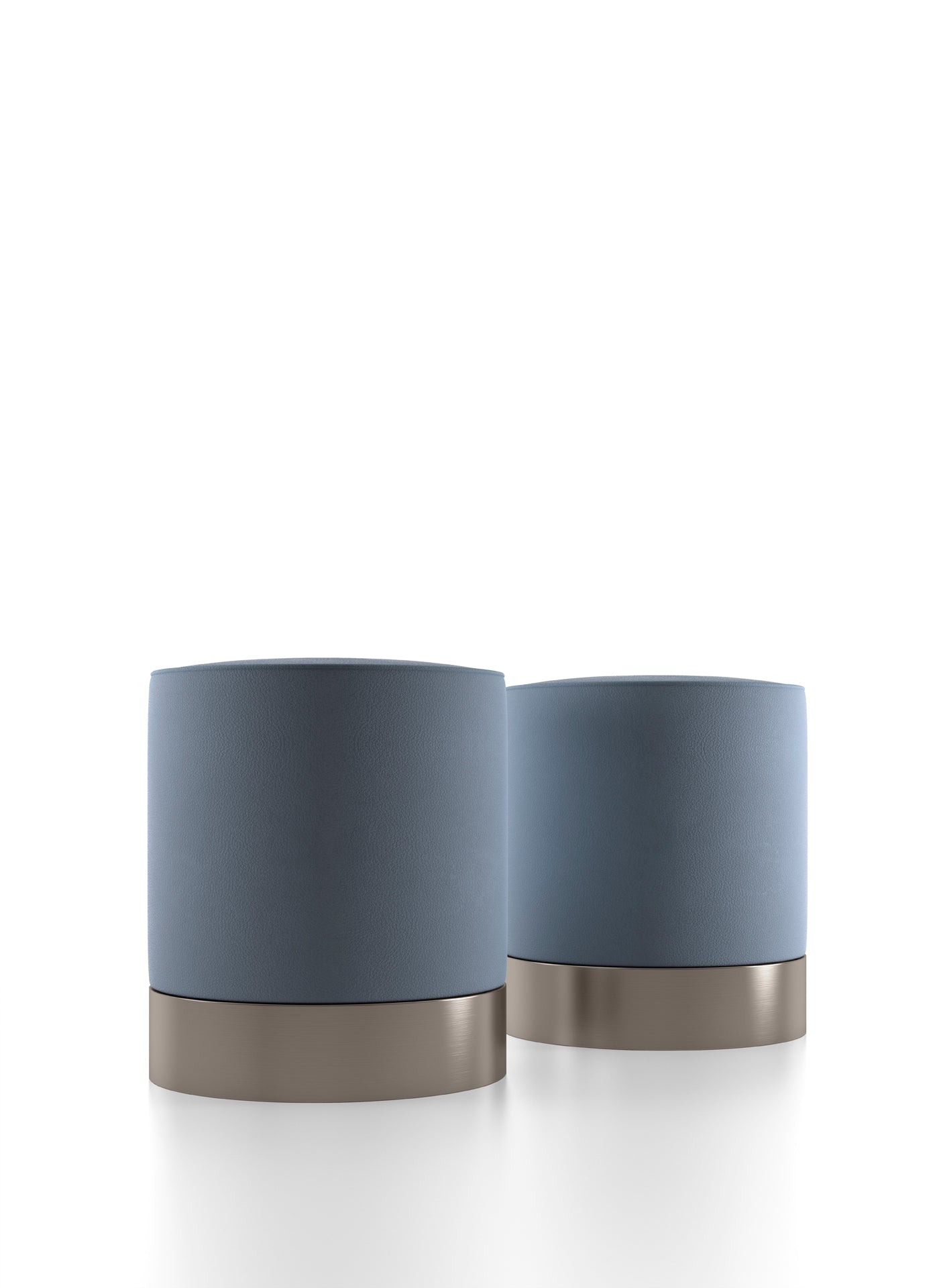 Two cylindrical blue leather ottomans with bronze metal bases