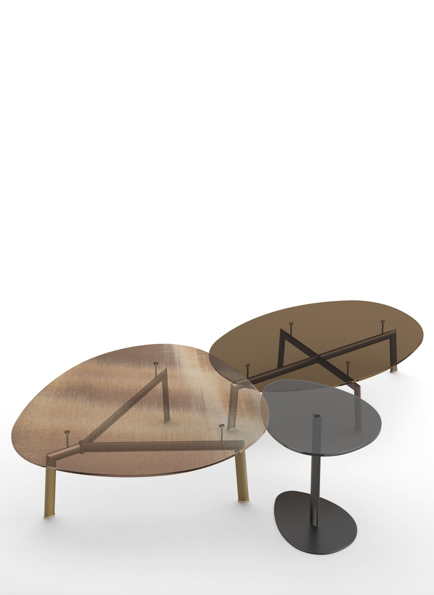 Studio shot of three oval glass coffee tables overlapping on white background.
