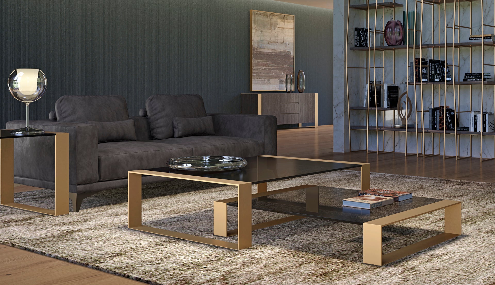 Living room view with dark sofa, gold metal coffee table, area rug, and shelving unit.