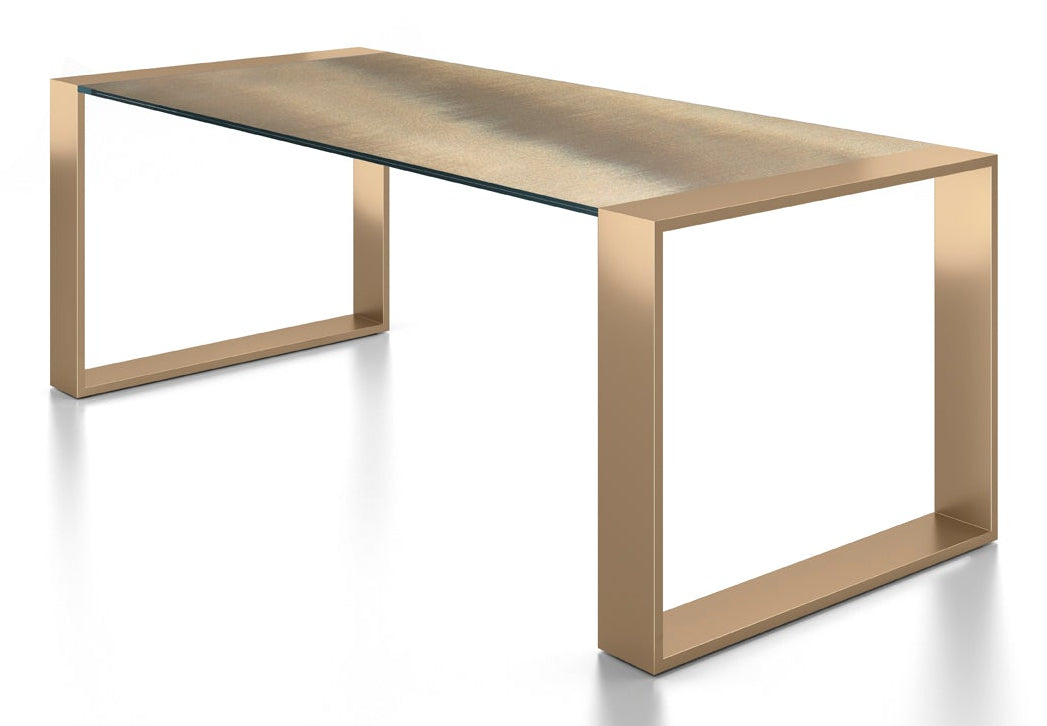 View dining table with glass top and bronze base.