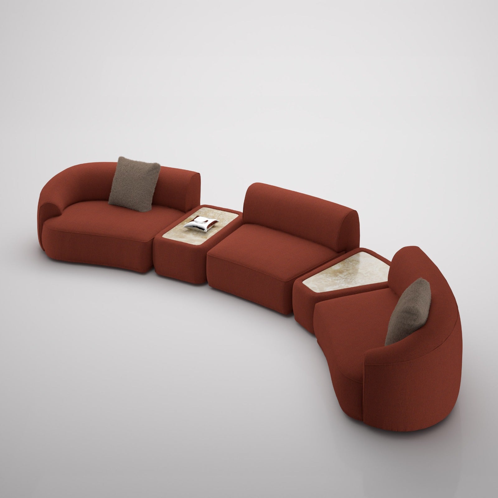 Modern red sofa with cushions on a light gray background