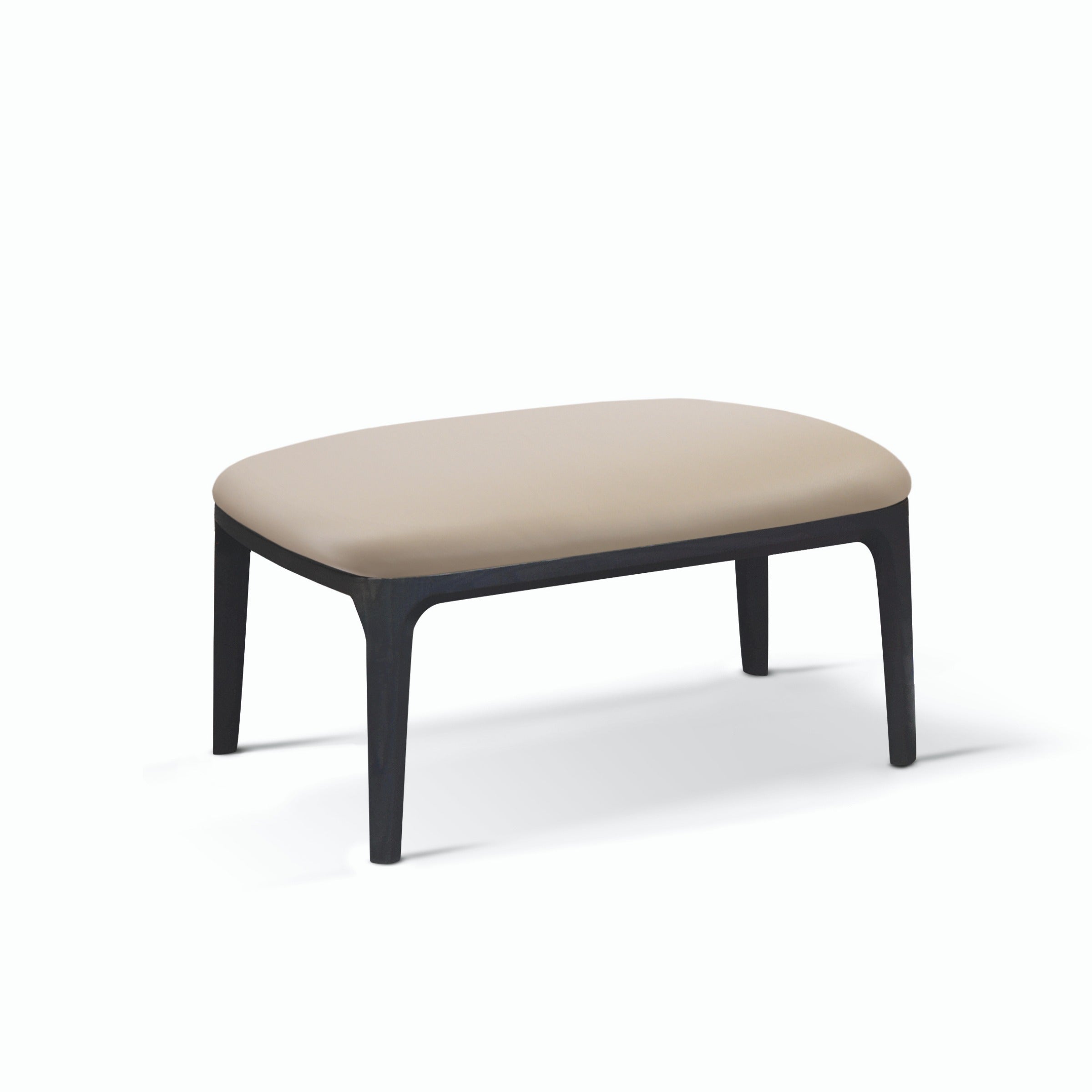 Studio shot of wood ottoman with beige upholstered top