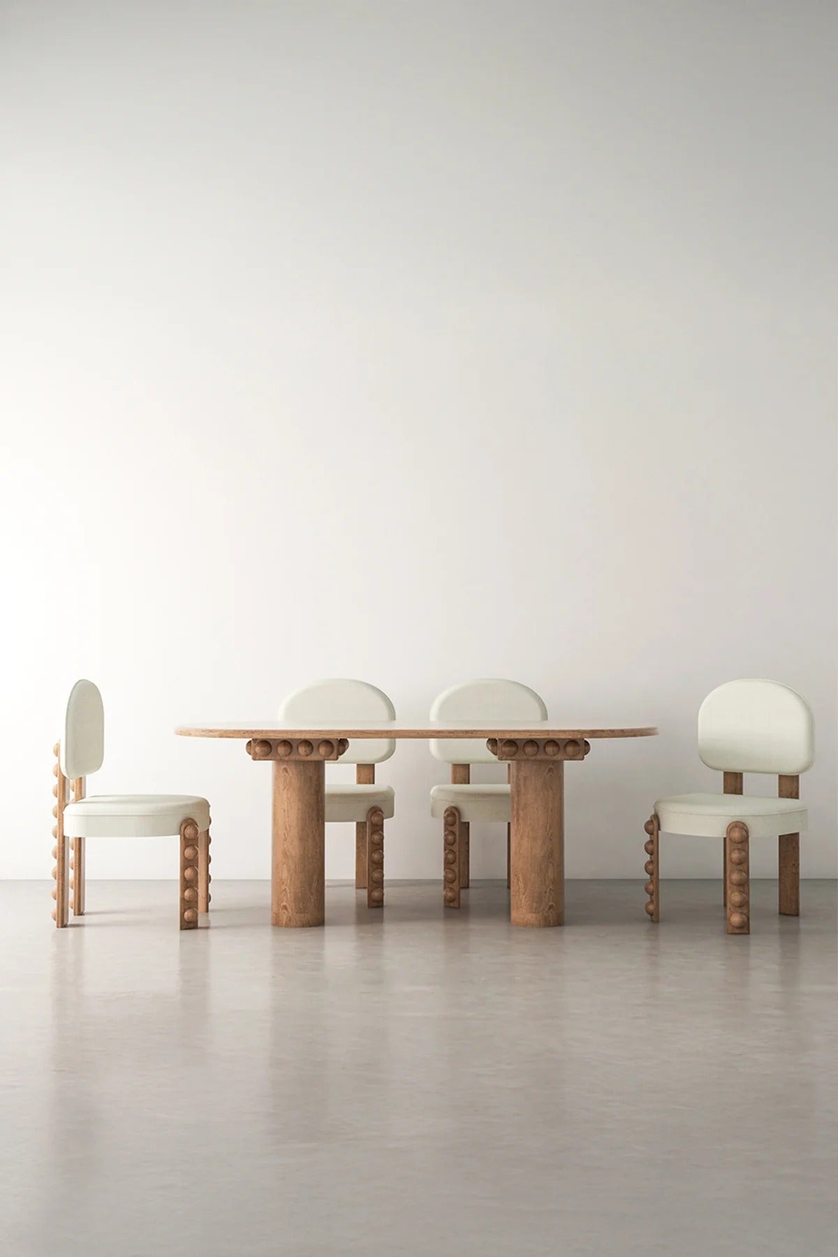 dining table and four chairs with wooden bobble details