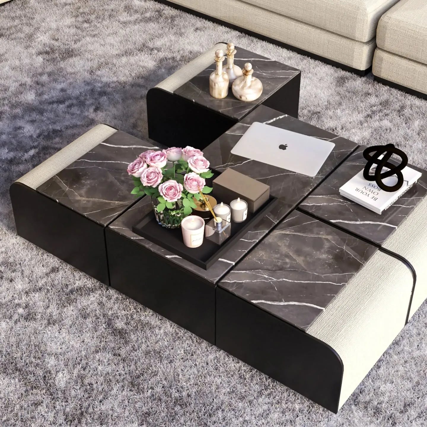 View of modular black marble coffee table on gray rug