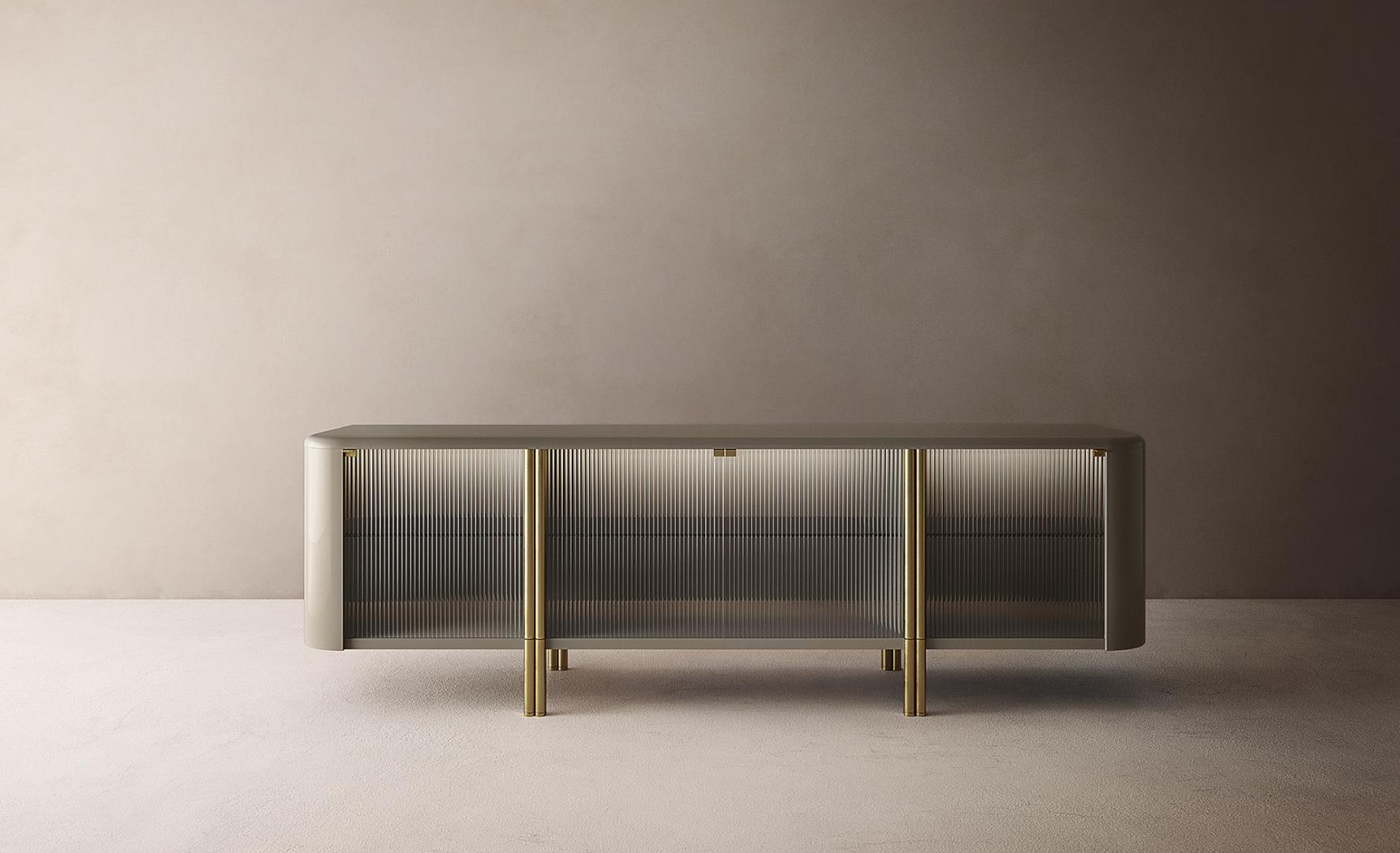 A modern sideboard with ribbed glass doors and brass legs, perfect for stylish living room storage and decor.