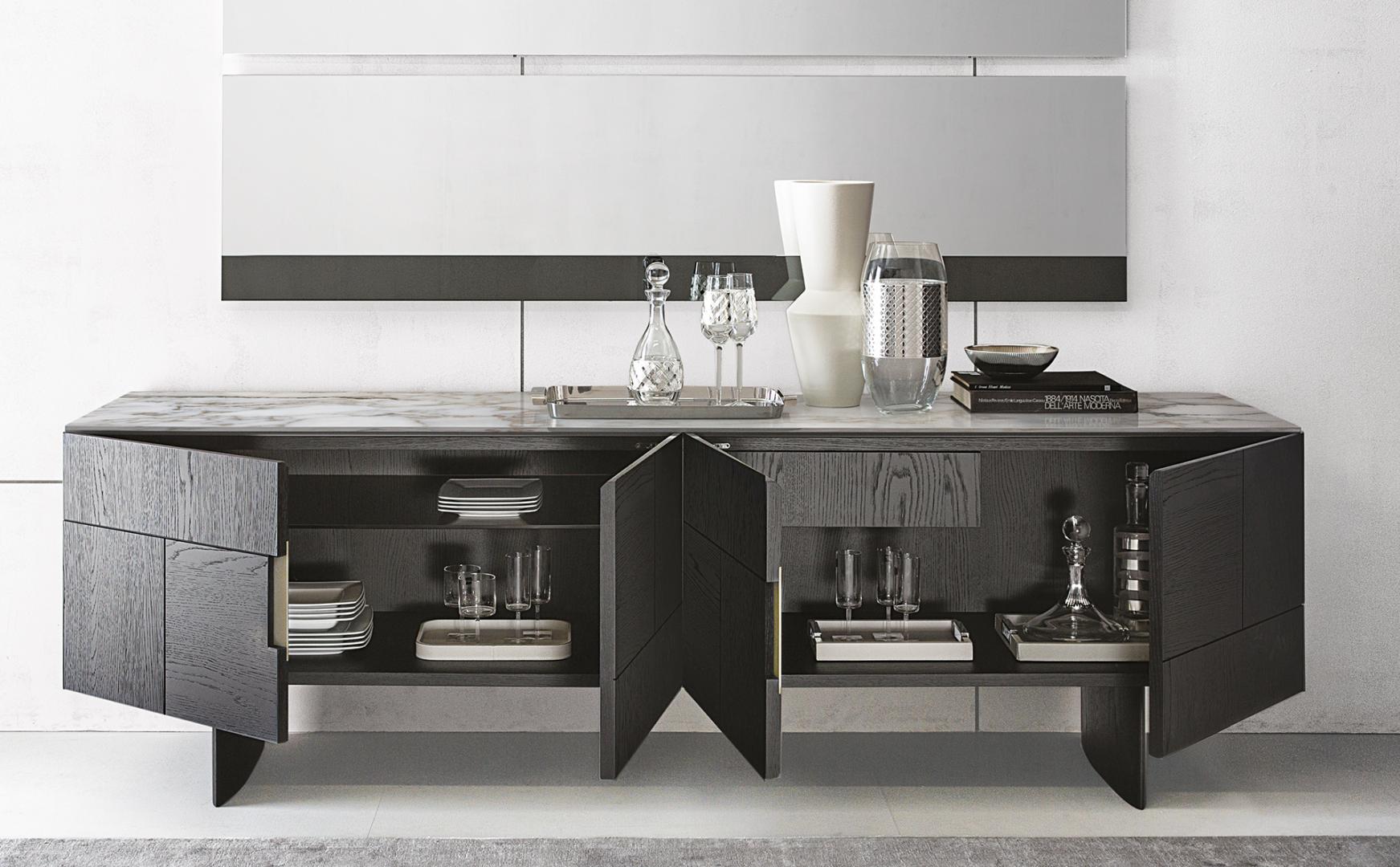  Modern dining room featuring the Casamilano Arne Sideboard. Dark wood cabinet with marble top, perfect for luxury dining room storage