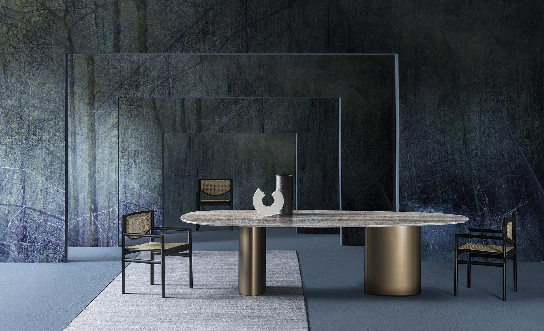 Interior view of Casamilano Tangeri dining table and chairs against a forest backdrop. Modern luxury furniture for contemporary homes