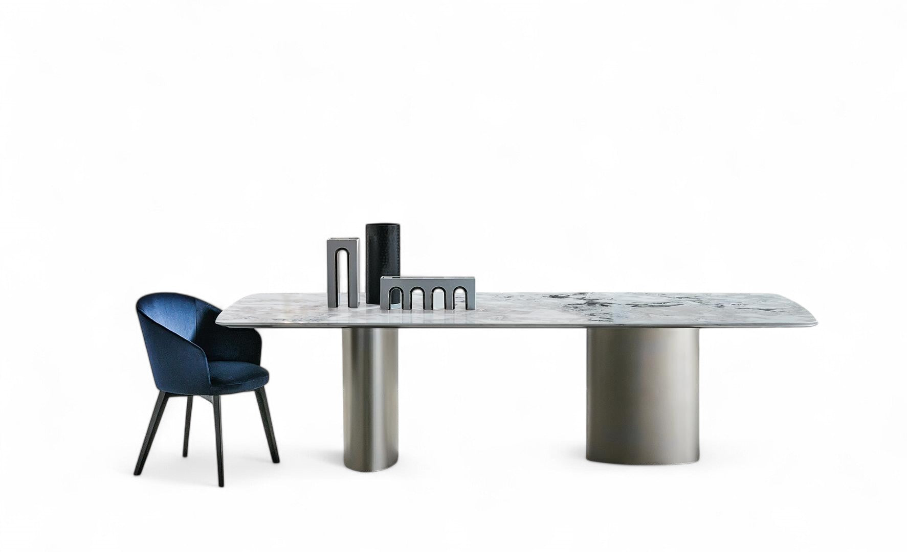 Dining table with marble top, metal cylinder bases, blue velvet chair