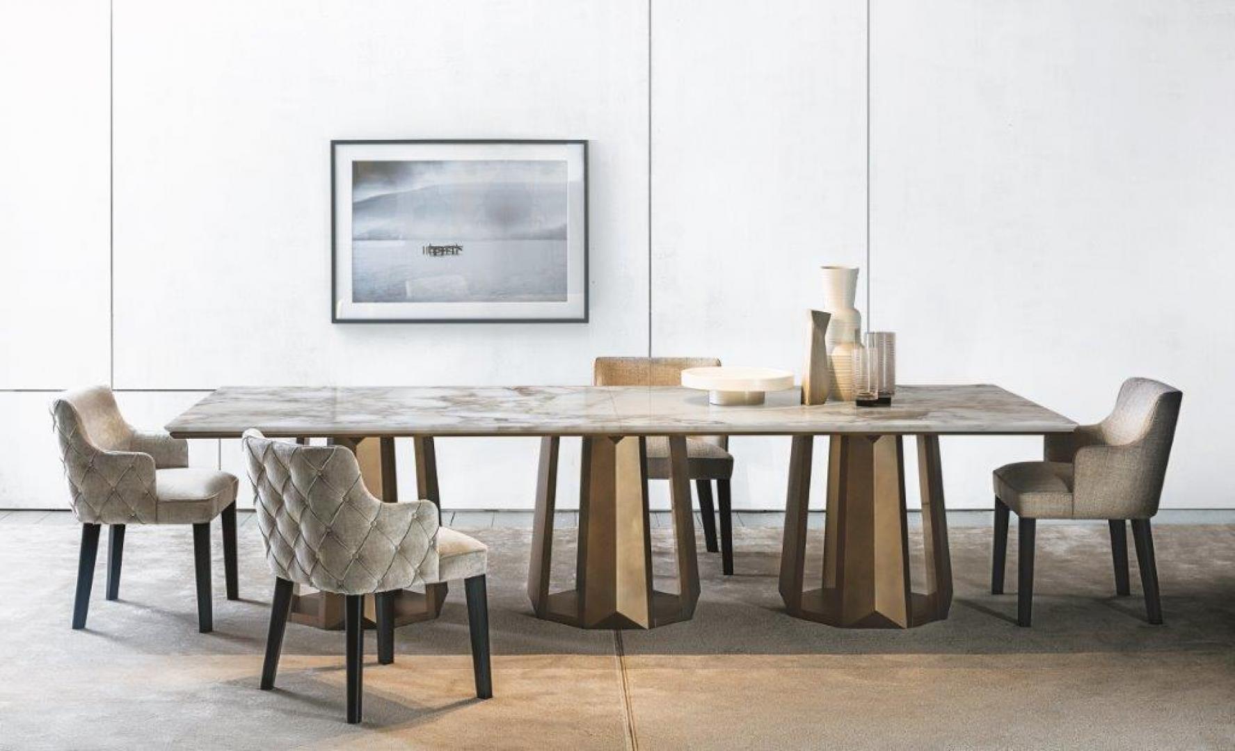 Modern dining room with Casamilano's Royale Capitonné chairs and a marble-topped table, perfect for luxury home decor and contemporary design