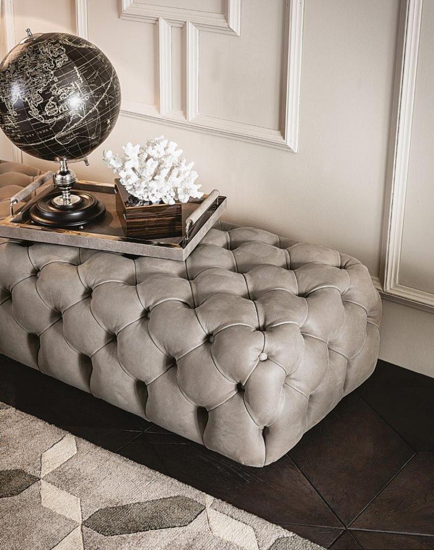 Interior view of the Casamilano Hyatt 160 pouf. A luxurious tufted leather ottoman perfect for adding elegance and comfort to any living space.