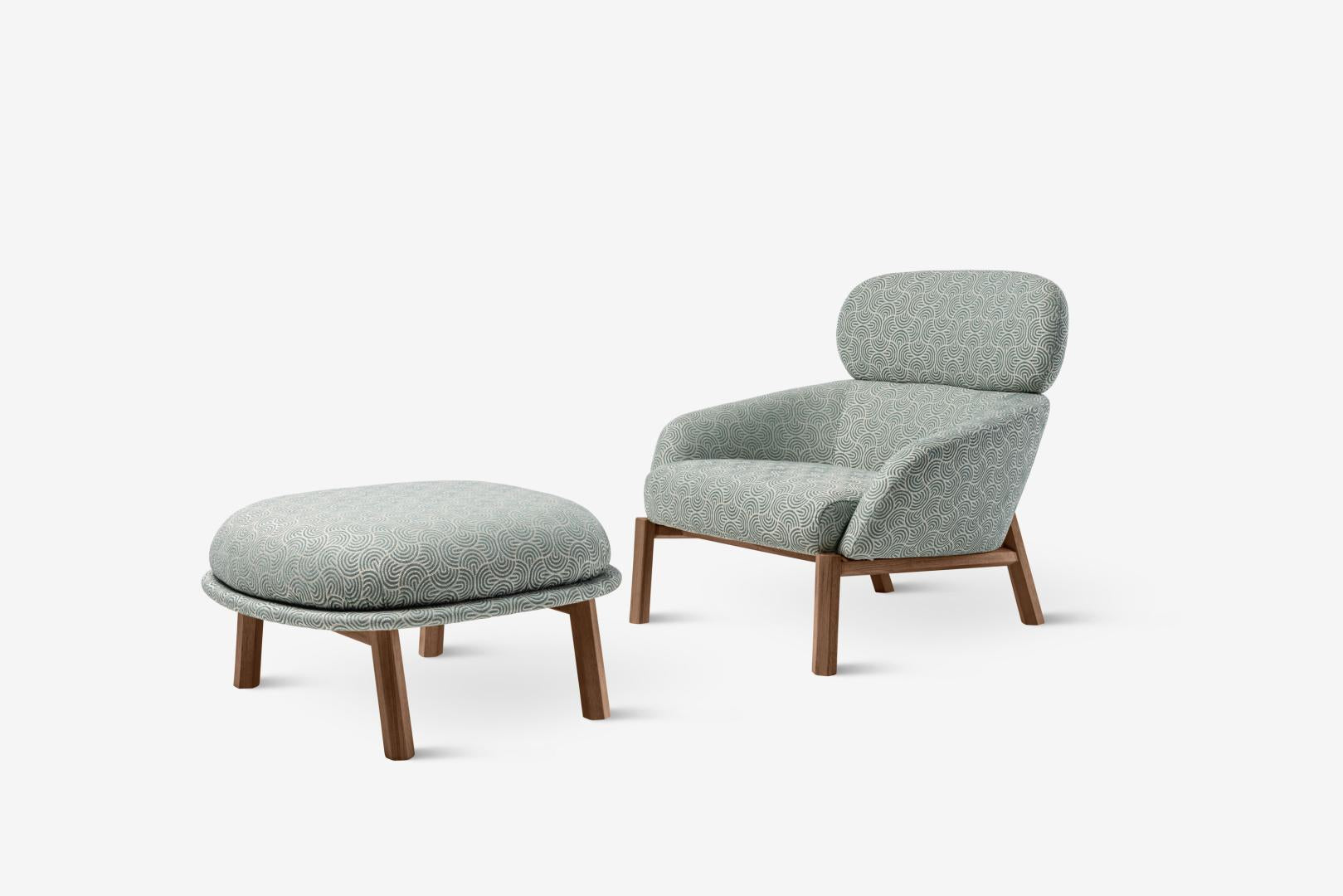 Studio shot of the Casamilano Elton IN & OUTDOOR pouf featuring patterned fabric and wooden frame. Ideal modern seating for stylish living rooms