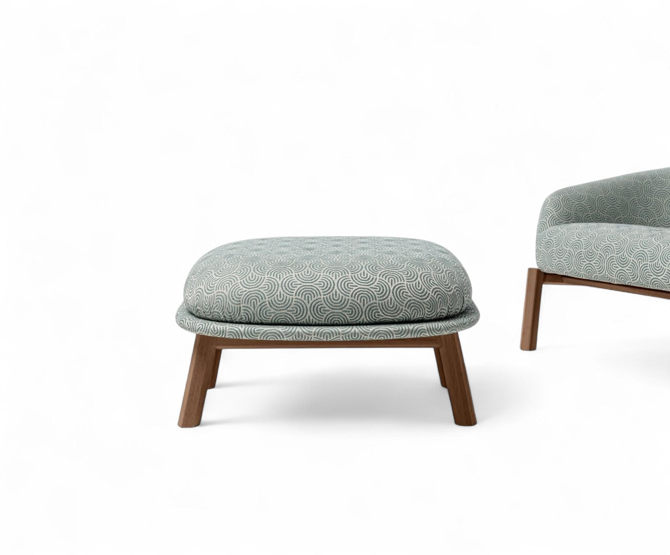 Studio shot of upholstered ottoman and partial armchair on white background.
Ottoman with green patterned fabric and wood legs.
Upholstered ottoman and armchair with wood base and patterned fabric.
Furniture set including ottoman and armchair with patterned upholstery.
Ottoman with green geometric pattern fabric and dark wood legs.
Close up of upholstered ottoman and armchair with wood frame.
Green patterned fabric ottoman and partial matching armchair on white.
Wood frame ottoman with patterned cushion and