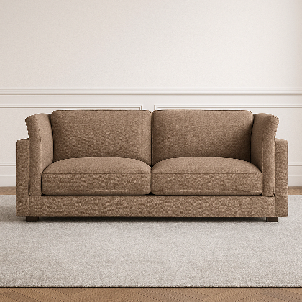 View of brown fabric sofa on light gray rug in room.
Brown fabric sofa, gray rug, white wainscoting, hardwood floor, living room furniture, interior design, home decor, seating.
Brown fabric sofa on light gray rug against white wainscoting wall.