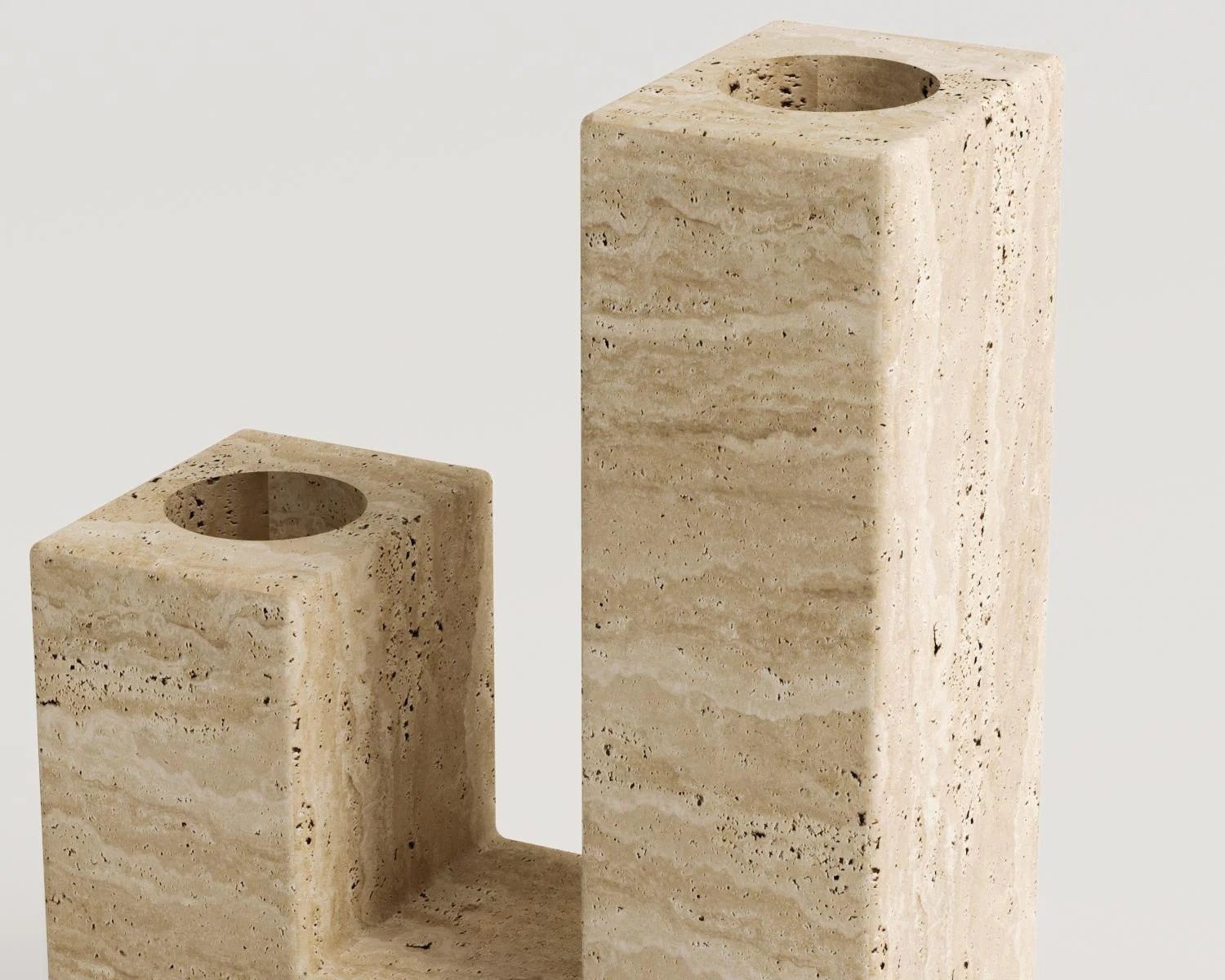 Close up view of travertine stone candle holder decor