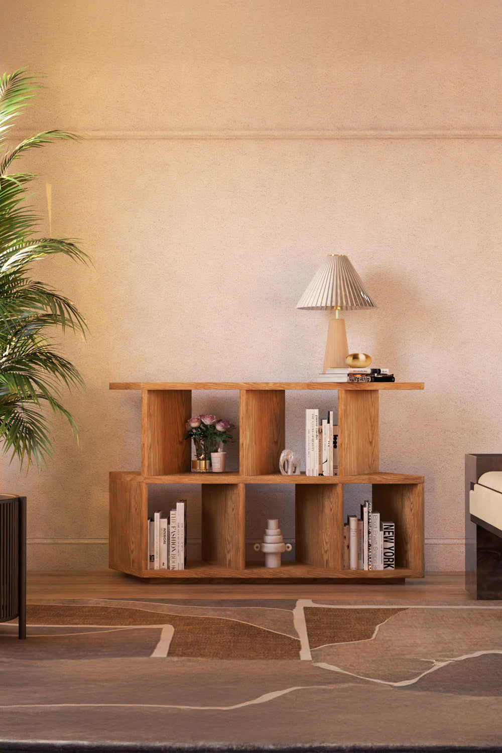 Interior view of wooden modular shelving unit with decor and books