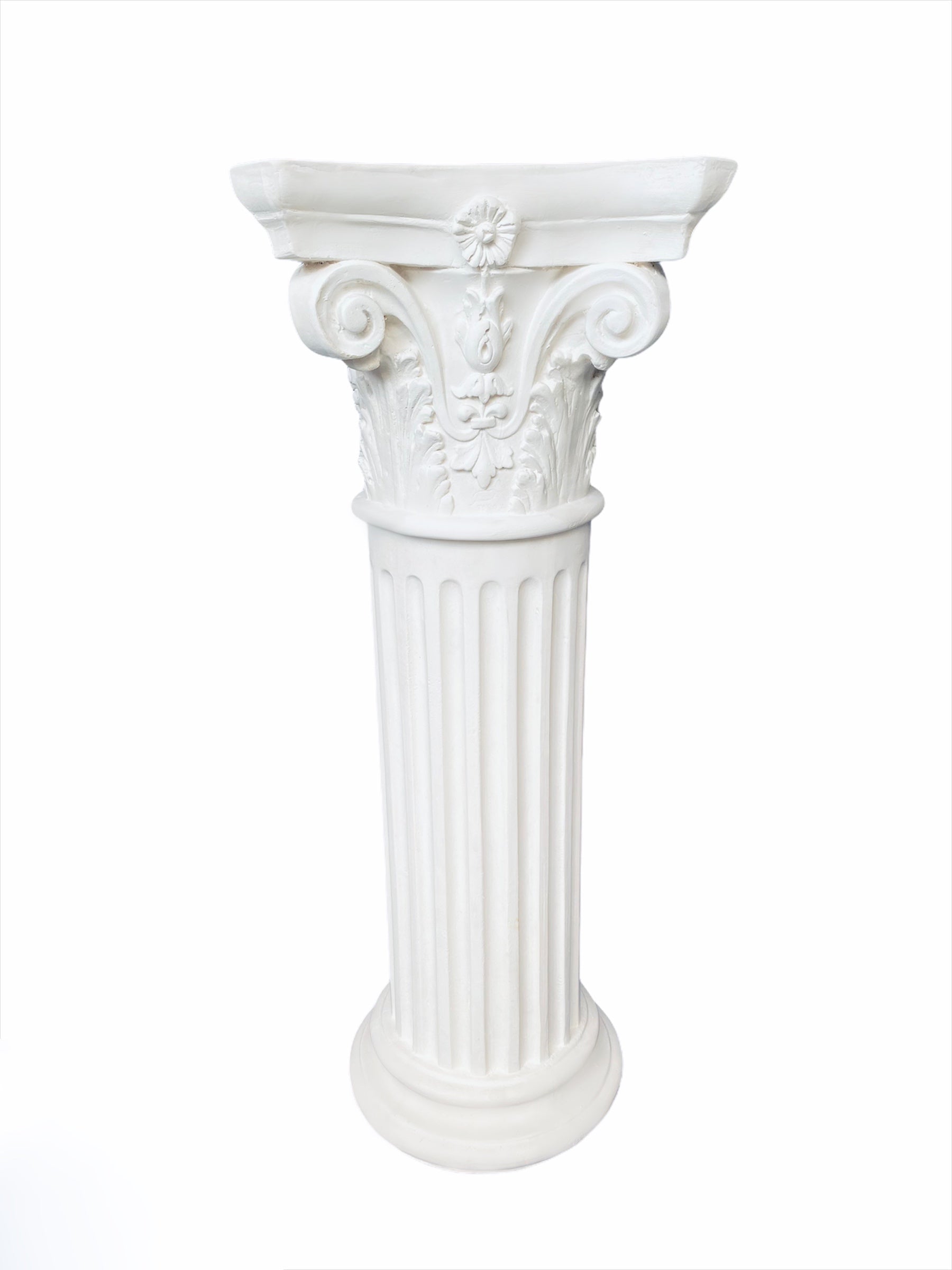 White classical column pedestal with ornate capital and fluted shaft decor