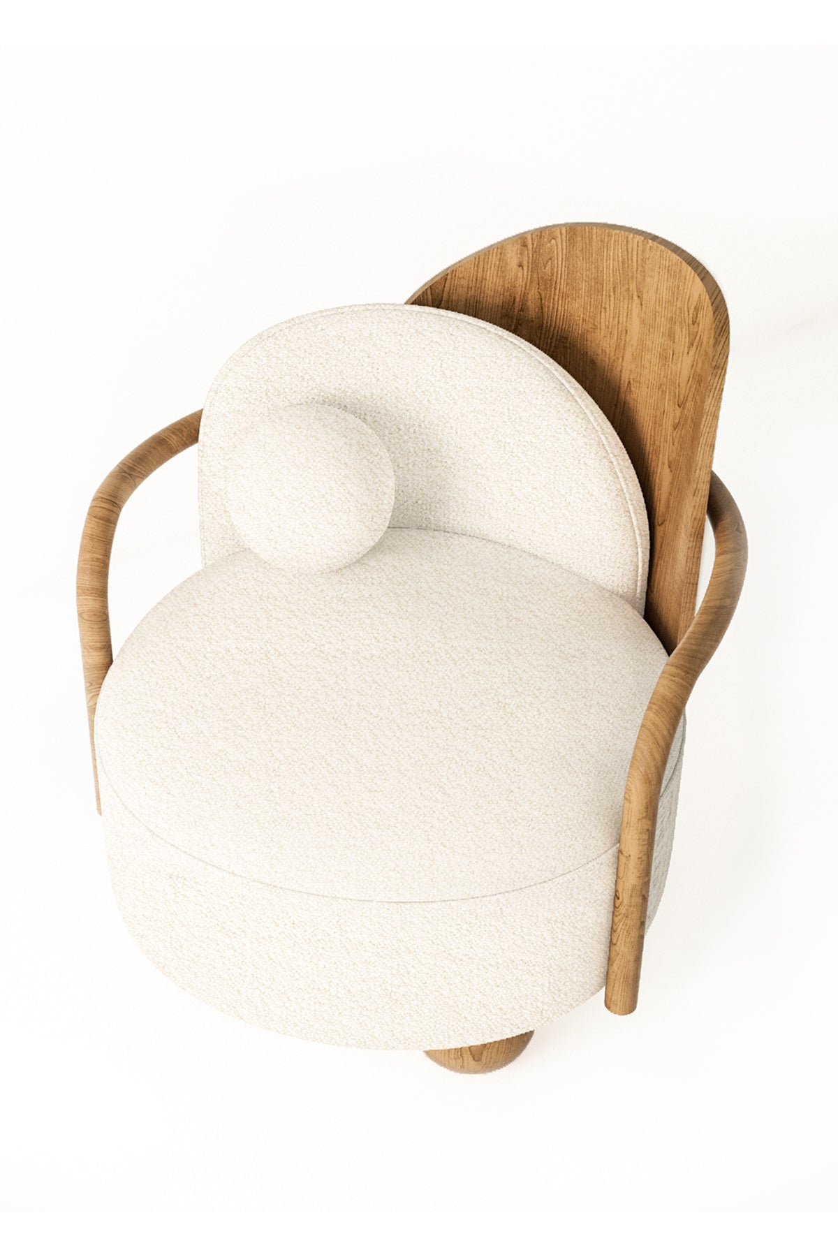 Overhead view of round upholstered chair with wood back and arms.