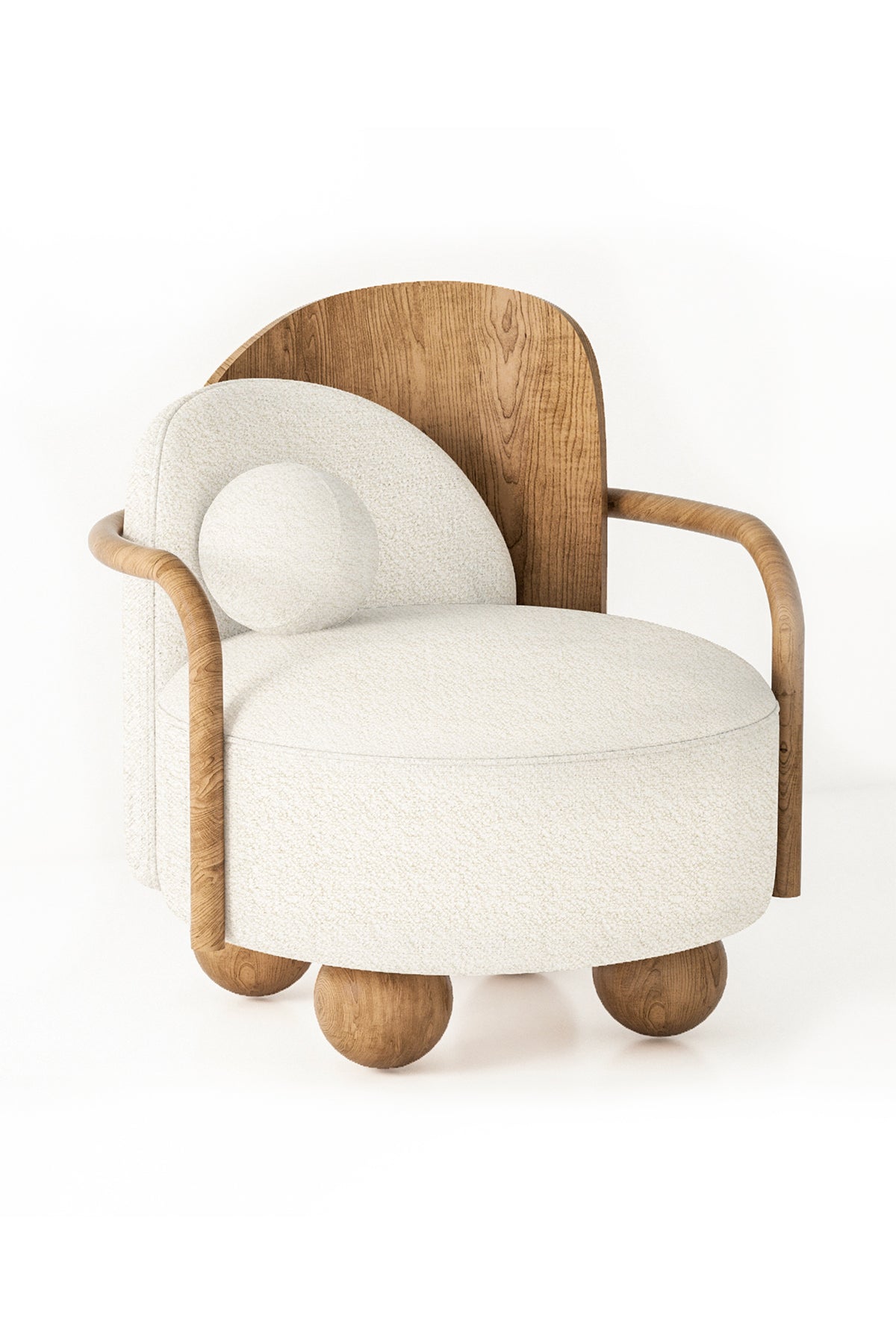 Studio shot of white upholstered armchair with wood back and arms.