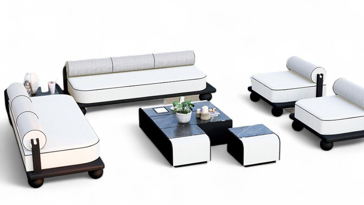 White upholstered sofa set and black coffee table furniture