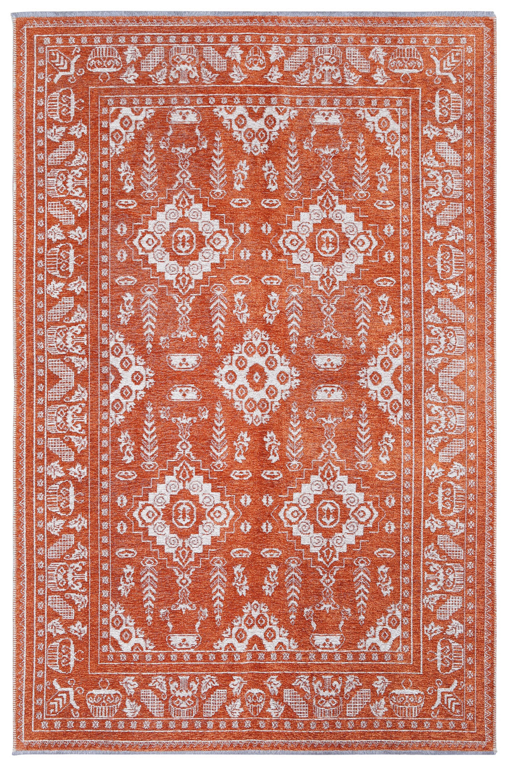 Orange and white patterned area rug with geometric and botanical motifs