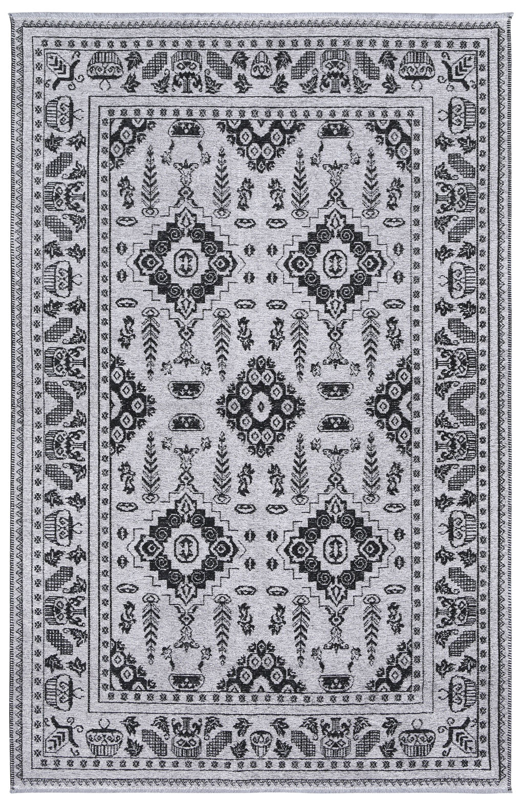 Overhead view of gray and black patterned area rug with border