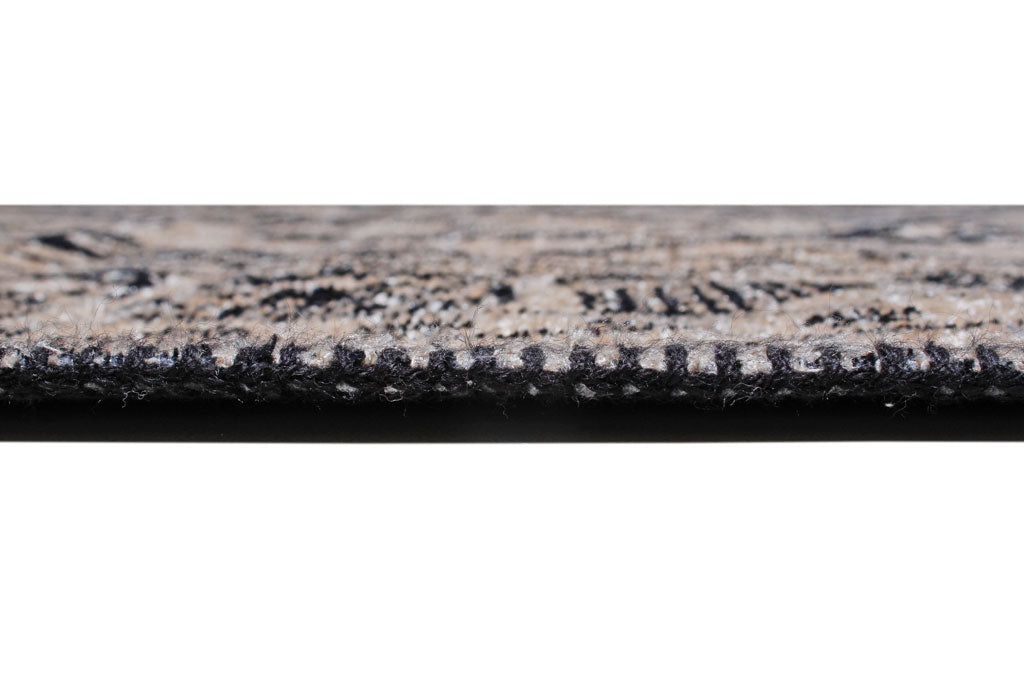 Close up view of the edge of a patterned rug