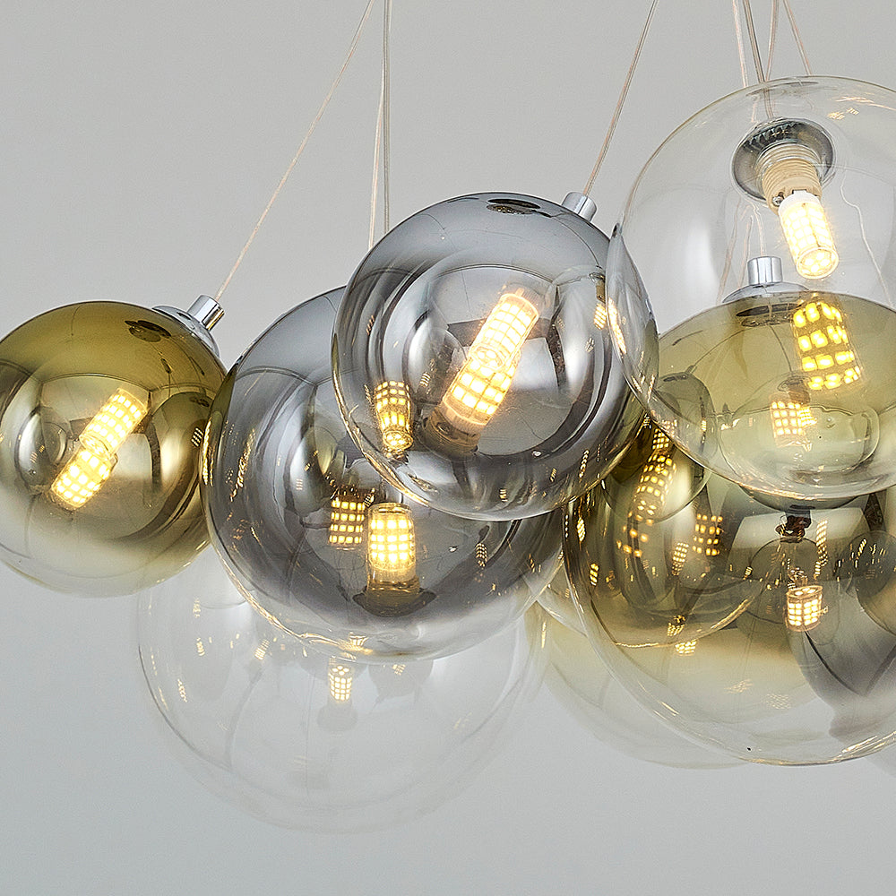 Close up of glass sphere lighting fixture with LED bulbs