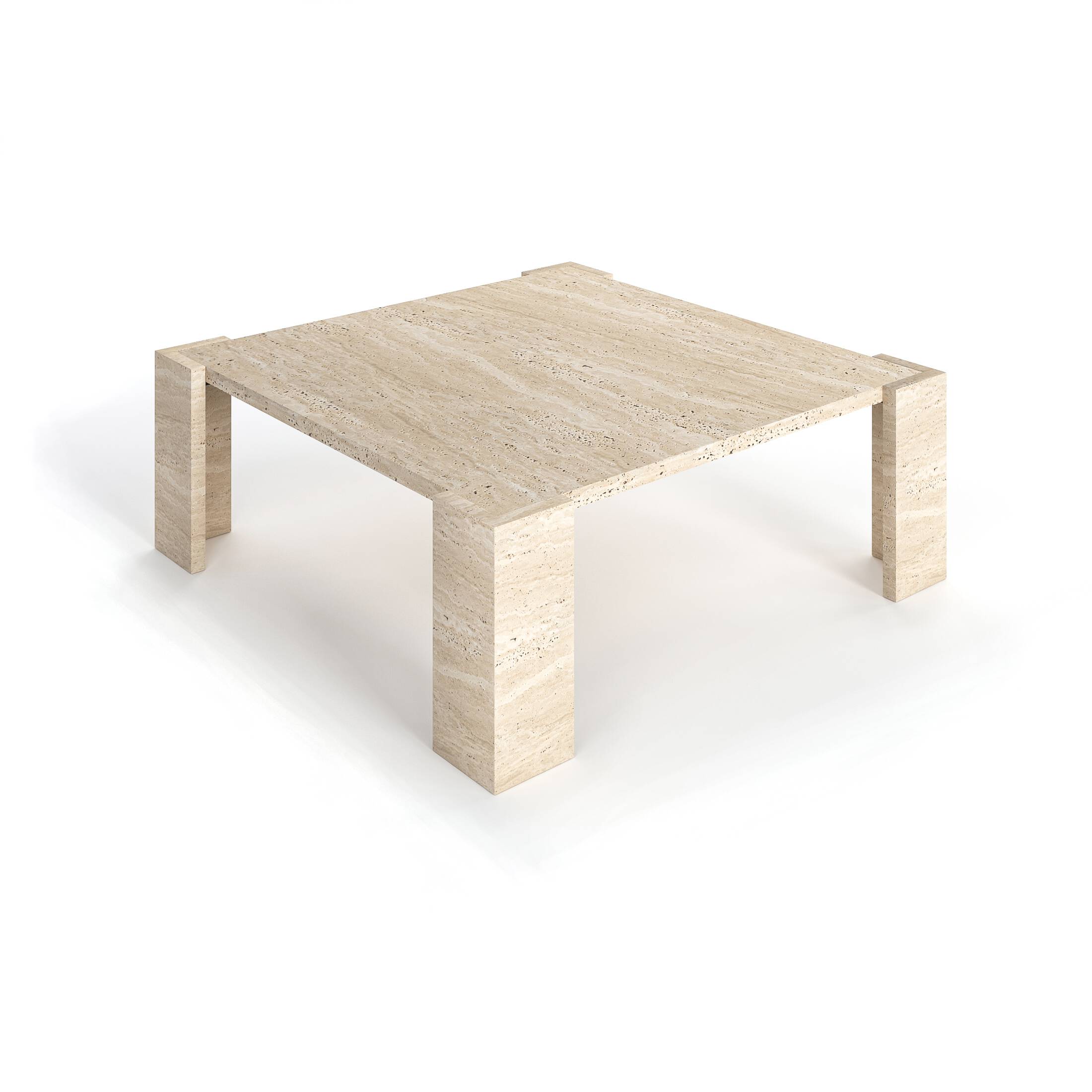 Eye-level studio shot of the Luzione travertine coffee table. A square, minimalist design with thick top and block legs. Ideal for modern living rooms.