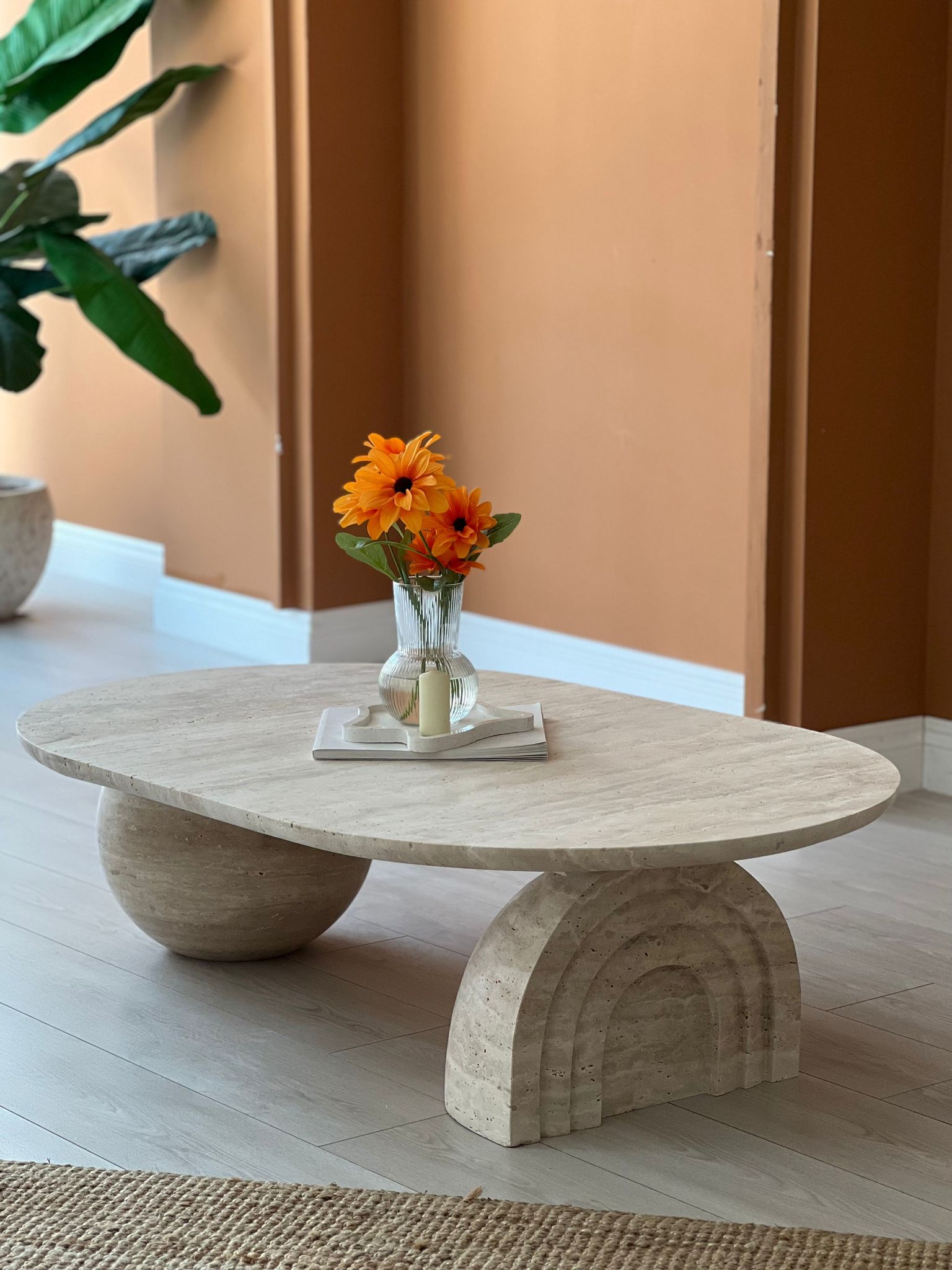 Flore Sculptural Travertine Table with Arch and Sphere Base – Artistic Modern Design