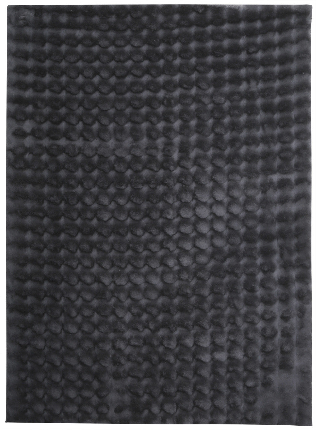 Dark gray rug with repeating scalloped texture pattern