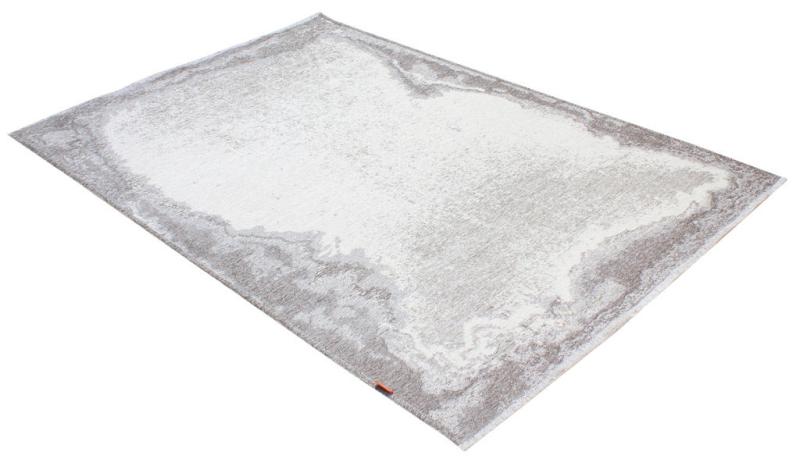 White and gray abstract rectangular area rug on white background