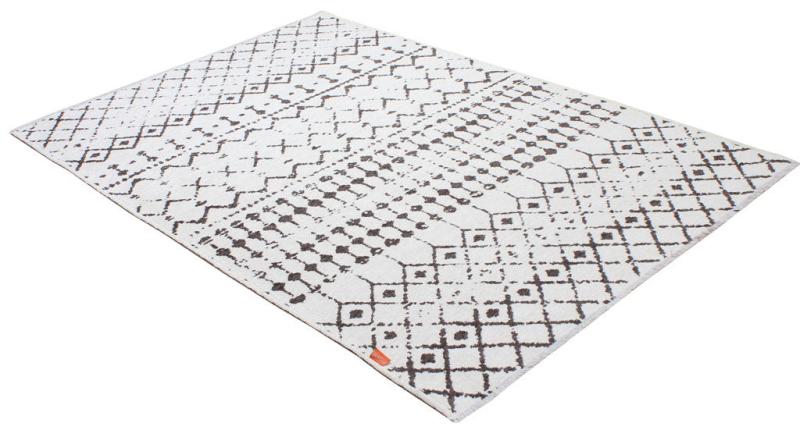 White and brown geometric pattern area rug