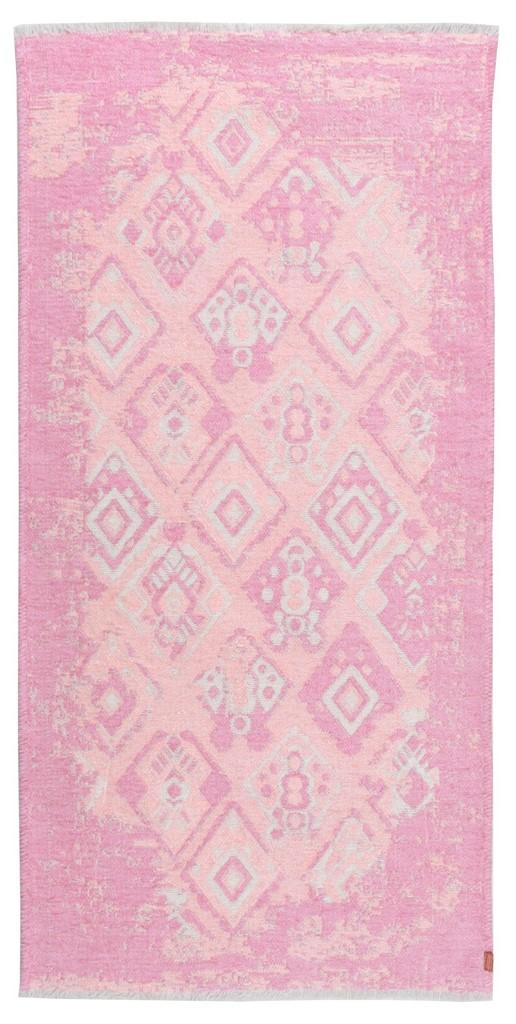 Pink and white geometric patterned area rug textile
