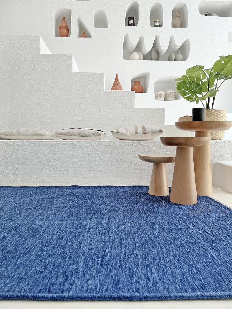 Moretti Plain Rug is displayed in a serene living room, illustrating its calming neutral tones.
