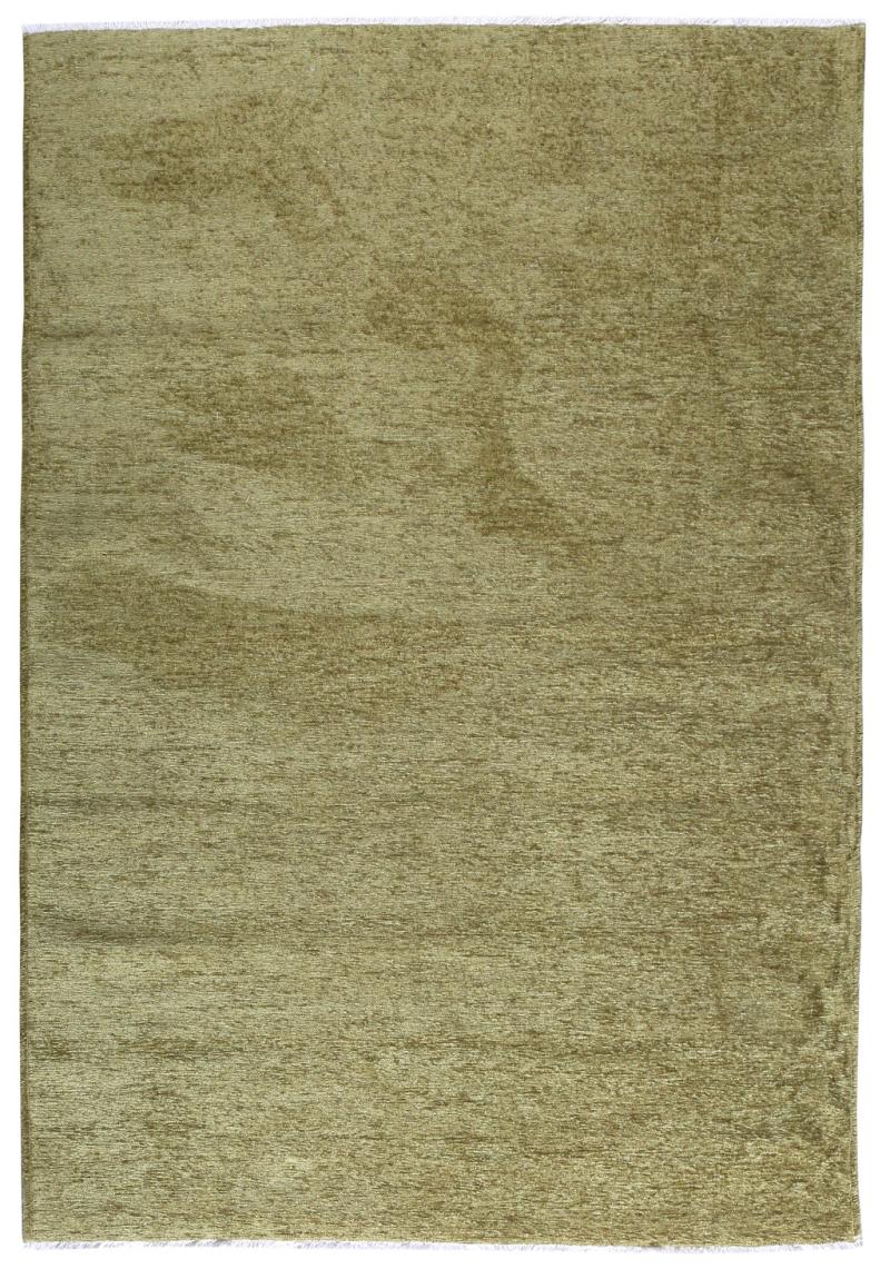 Close-up of Moretti Plain Rug's fibers, showcasing the softness and quality of its beige material.
