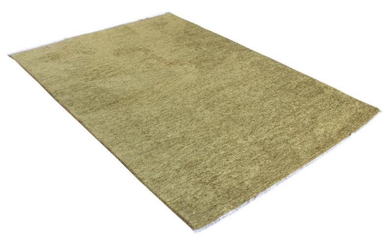 Angled view of Moretti Plain Rug in a minimalist bedroom, highlighting its subtle elegance.