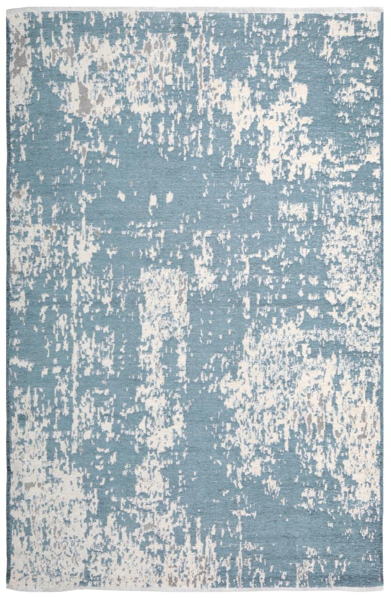 Overhead view of blue and white abstract patterned area rug