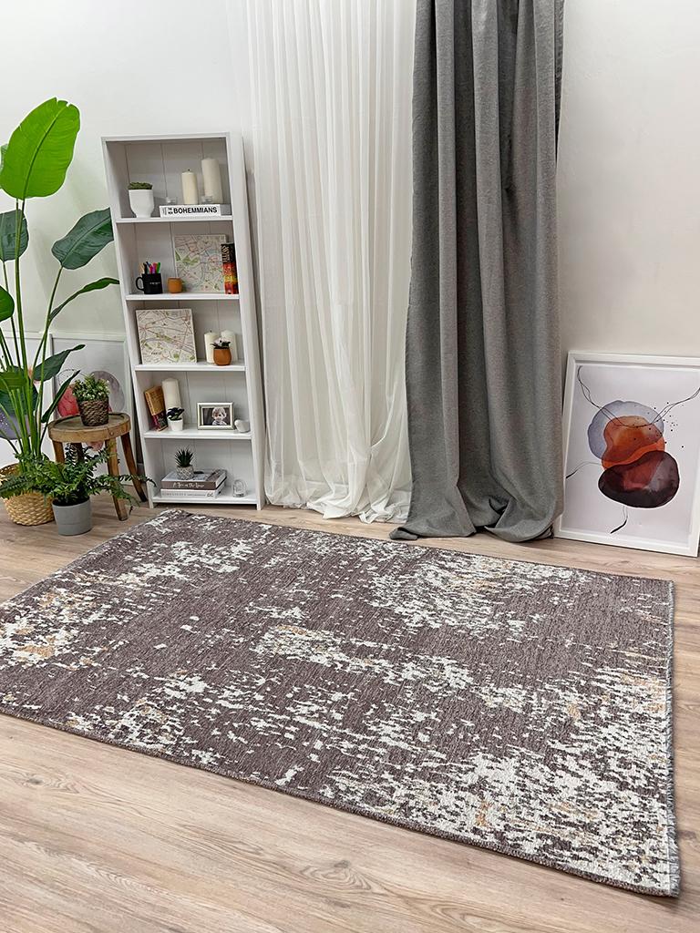 Front view of Moretti Side Reversible Rug displaying its beige and gray dual-sided design, ideal for neutral-themed rooms.