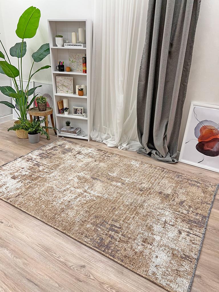 Close-up of Moretti Side Reversible Rug's pattern, highlighting the seamless blend of beige and gray tones.