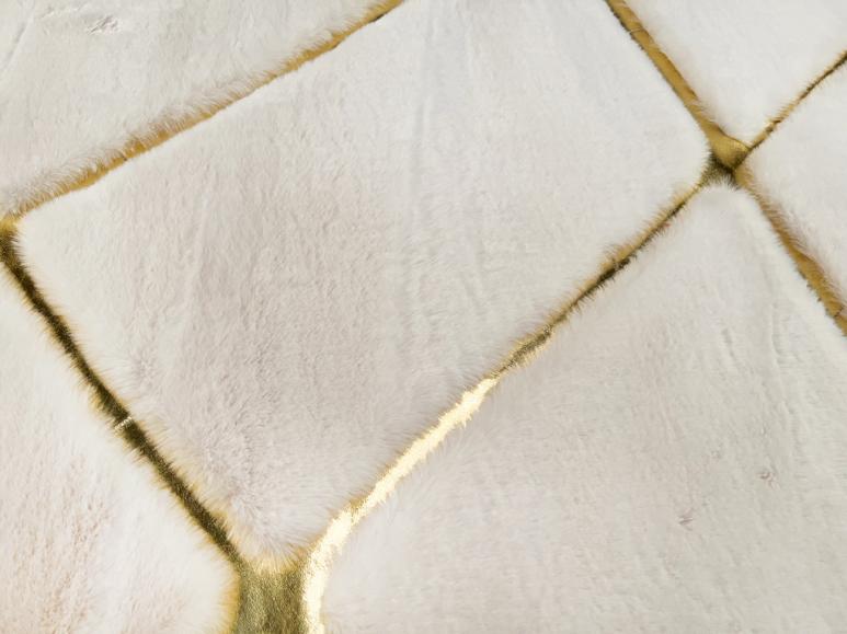 Rabbit Fur Rug placed in an upscale office, adding a touch of elegance with its cream and gold design.