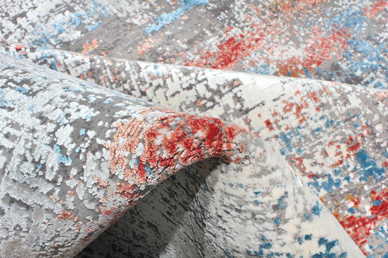 Angled view of Lexus Modern Rug in a busy living room, highlighting its capacity to withstand frequent use without compromising style.