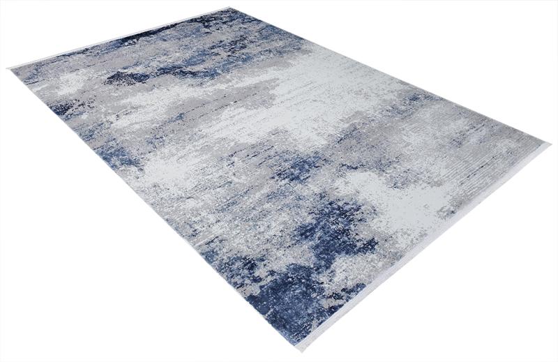 Close-up of the Lizy Rug's pattern, showcasing its intricate design and bold blue hues that enliven spaces.