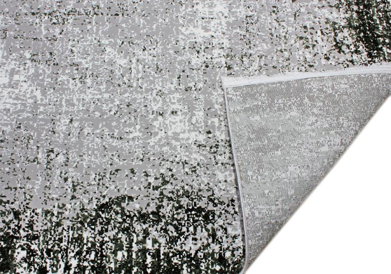 Overhead view of gray and black abstract patterned rug