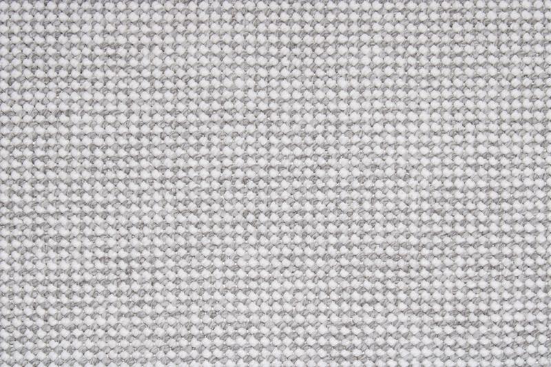 Nairobi Rug displayed in a minimalist living space, providing a subtle and sophisticated touch with its neutral design.