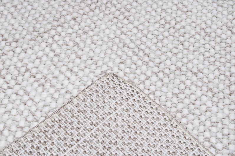 Nairobi Rug placed in a contemporary living area, adding warmth and elegance with its neutral design.