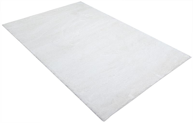 Tampa Shaggy Rug displayed in a comfortable living space, enhancing the area with its inviting white design.